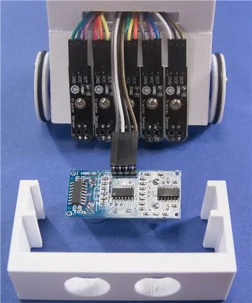 Monte el sensor de ultrasonido y el cuerpo delantero …