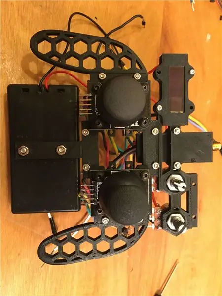 Montage: bevestig de batterijhouder aan de basis