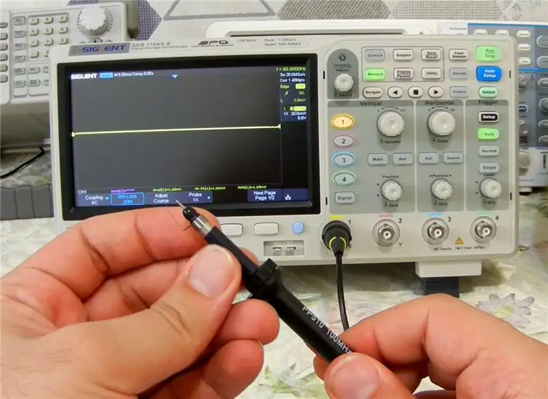 Figura 9, Substitució del cable de terra de la sonda per una molla de terra